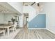 Bright living room featuring an open floor plan, gray wood floors and staircase at 6920 Wesley Ct, Indianapolis, IN 46220