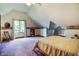Spacious bedroom with vaulted ceilings, large window, and soft carpet at 7533 Deerfield Dr, Greenfield, IN 46140