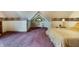 Cozy bedroom featuring unique architectural details, carpet, and natural light at 7533 Deerfield Dr, Greenfield, IN 46140