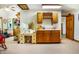 Spacious room with a kitchenette, cabinets, and natural light at 7533 Deerfield Dr, Greenfield, IN 46140