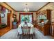 Charming dining room with decorative wallpaper and ample natural light at 7533 Deerfield Dr, Greenfield, IN 46140