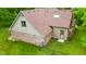 Back of home with a brick facade and well maintained green yard at 7533 Deerfield Dr, Greenfield, IN 46140