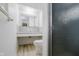 Clean and functional bathroom featuring shower, toilet, vanity, and ample lighting at 8022 Hoover Ln, Indianapolis, IN 46260