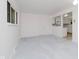 Spacious living room with neutral carpet and plenty of natural light at 8022 Hoover Ln, Indianapolis, IN 46260