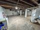 Spacious basement featuring painted walls, exposed ceiling and concrete floor at 810 N Bosart Ave, Indianapolis, IN 46201