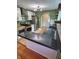 Modern kitchen with new stainless steel appliances, updated cabinetry, and stylish countertops at 810 N Bosart Ave, Indianapolis, IN 46201