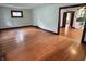 Bright living room featuring hardwood floors and natural light at 810 N Bosart Ave, Indianapolis, IN 46201
