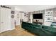Spacious living area featuring a cozy sofa, trendy decorations, and ample natural light at 818 Vasbinder Dr, Chesterfield, IN 46017