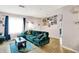 Comfortable living room with ample natural light, stylish decor, and a modern sofa at 818 Vasbinder Dr, Chesterfield, IN 46017