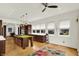 Spacious kitchen with a custom island, stainless appliances, and hardwood floors at 838 Woodruff Place West Dr, Indianapolis, IN 46201