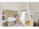 Charming kitchenette with vintage sink, floating shelves, and natural light filtering through the window at 838 Woodruff Place West Dr, Indianapolis, IN 46201