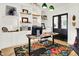 Bright office space featuring custom built-ins and desk at 838 Woodruff Place West Dr, Indianapolis, IN 46201
