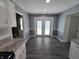 A bright dining area features gray walls, dark wood floors, and white trim at 8433 Fairwind Ct, Indianapolis, IN 46256