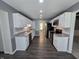 Spacious kitchen featuring modern stainless steel appliances, granite countertops, and ample storage at 8433 Fairwind Ct, Indianapolis, IN 46256