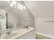Bathroom featuring a double sink vanity with plenty of natural light at 8924 Stormhaven Ct, Indianapolis, IN 46256