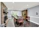 Dining room with hardwood floors, large dining table, and lots of seating at 8924 Stormhaven Ct, Indianapolis, IN 46256