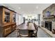 Beautifully decorated dining room next to the kitchen with fireplace at 8924 Stormhaven Ct, Indianapolis, IN 46256