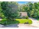 Attractive single-Gathering home featuring lush landscaping, mature trees, and a well-maintained lawn for curb appeal at 8924 Stormhaven Ct, Indianapolis, IN 46256