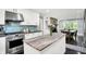 Beautiful kitchen view with an island featuring lovely stone countertops at 8924 Stormhaven Ct, Indianapolis, IN 46256