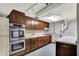 Basement kitchen with a double oven, ample counter space, and ample storage at 8924 Stormhaven Ct, Indianapolis, IN 46256