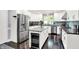 Modern kitchen with stainless steel appliances, island with a wine cooler at 8924 Stormhaven Ct, Indianapolis, IN 46256