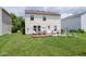 Large backyard includes a patio area, perfect for entertaining, and a play set for the  at 9215 Stones Bluff Pl, Indianapolis, IN 46113
