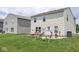 This spacious yard is equipped with a patio, grill, and playground at 9215 Stones Bluff Pl, Indianapolis, IN 46113