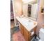 Bathroom with a vanity, mirror, and neutral colors for a relaxing feel at 9215 Stones Bluff Pl, Indianapolis, IN 46113