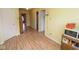 Yellow bonus room provides access to other rooms in the house at 9215 Stones Bluff Pl, Indianapolis, IN 46113