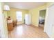 Bonus room with a desk, chair, refrigerator and access to the bedroom at 9215 Stones Bluff Pl, Indianapolis, IN 46113