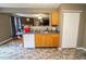 Well-lit kitchen featuring modern appliances, ample cabinetry, and seamless flow to the living space at 9215 Stones Bluff Pl, Indianapolis, IN 46113