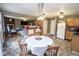 Open concept eat-in kitchen flowing into the living room for seamless entertaining and Gathering time at 9215 Stones Bluff Pl, Indianapolis, IN 46113