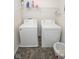 The laundry room features a side-by-side washer and dryer and lots of space at 9215 Stones Bluff Pl, Indianapolis, IN 46113