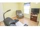 Comfortable living room with recliners and a window offering natural light at 9215 Stones Bluff Pl, Indianapolis, IN 46113