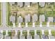 Overhead neighborhood view of many houses with manicured lawns and tree-lined street at 10107 Camp Creek Way, Indianapolis, IN 46229