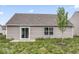 The house features a sliding glass door in the backyard at 10107 Camp Creek Way, Indianapolis, IN 46229
