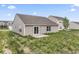 The house features a sliding glass door in the backyard at 10107 Camp Creek Way, Indianapolis, IN 46229