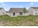 The house features a sliding glass door in the backyard at 10107 Camp Creek Way, Indianapolis, IN 46229