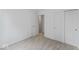 Neutral carpeted bedroom with a closet and open door with views into another room at 10107 Camp Creek Way, Indianapolis, IN 46229