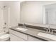 Modern bathroom featuring a double vanity with gray countertops, and a shower with tub combo at 10210 Samerton Ln, Indianapolis, IN 46239