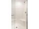 A glass door shower with a built in bench at 10210 Samerton Ln, Indianapolis, IN 46239