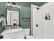 This bathroom features a marble countertop, modern fixtures, and a shower at 1046 N Hamilton Ave, Indianapolis, IN 46201