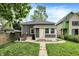 Charming home with well-manicured lawn and inviting backyard space at 1046 N Hamilton Ave, Indianapolis, IN 46201