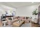 Comfortable living area connected to kitchen featuring modern design and natural light at 1046 N Hamilton Ave, Indianapolis, IN 46201