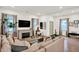 Spacious living room with fireplace, hardwood floors, and plenty of natural light at 1046 N Hamilton Ave, Indianapolis, IN 46201