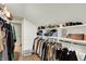 Organized walk-in closet with ample storage and shelving for clothes and accessories at 1046 N Hamilton Ave, Indianapolis, IN 46201