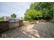 Outdoor kitchen complete with built-in grill and stone patio area at 10865 Fairwoods Dr, Fishers, IN 46037