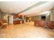 Finished basement includes a wet bar, kitchenette, and seating area, offering versatile living space at 10865 Fairwoods Dr, Fishers, IN 46037