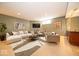 Finished basement offers versatile space with comfortable seating, a modern TV, and stylish decor at 10865 Fairwoods Dr, Fishers, IN 46037