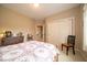Bright bedroom with natural light, a comfortable bed, closet and charming decor for a peaceful night's sleep at 10865 Fairwoods Dr, Fishers, IN 46037
